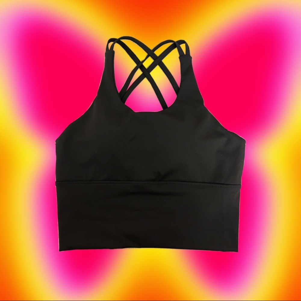 Super cute workout top with crisscross detailing!